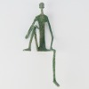 A Contemplative Metal Table Ornament