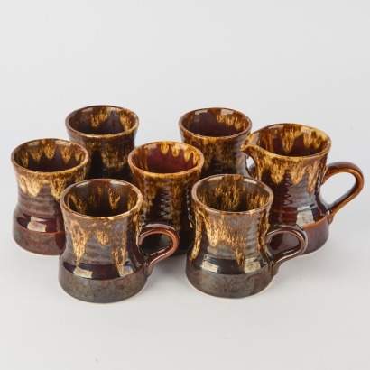 A Set of Crown Lynn Drip Glazed Mugs and Milk Jug
