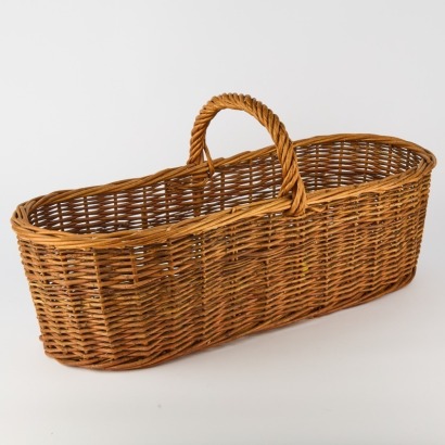 A Vintage French Wicker Baguette Basket
