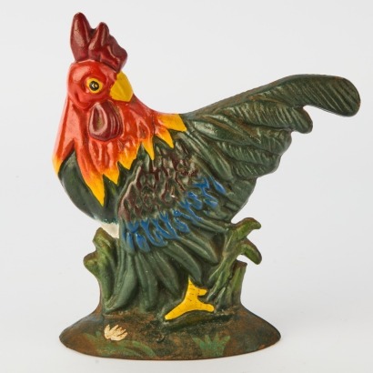 An Antique Cast Iron Cockerell Doorstop