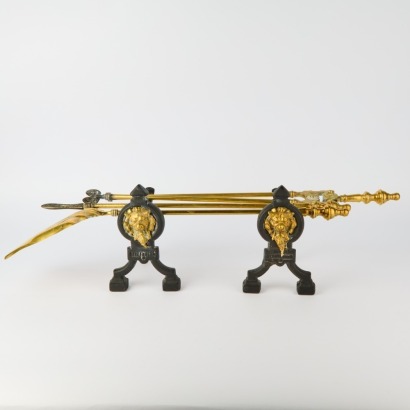 A Set of Brass Alloy Fire Utensils with Fire Dogs