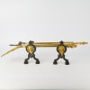 A Set of Brass Alloy Fire Utensils with Fire Dogs