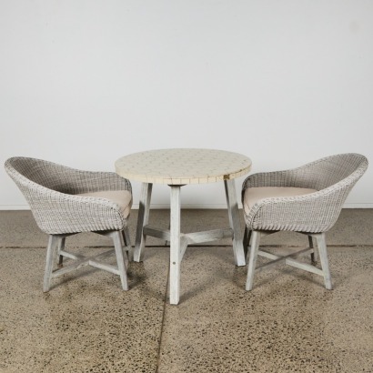 A Three-Piece Indoor/Outdoor Table and Chair Set