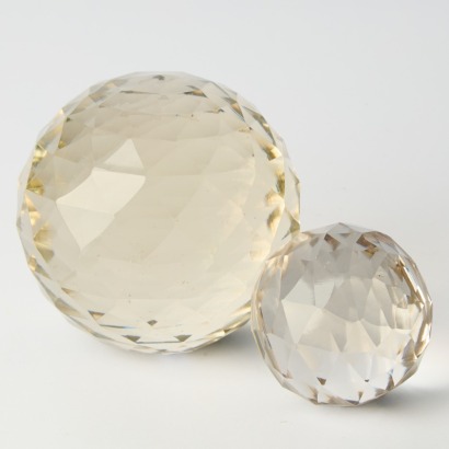 A Pair of Decorative Faceted Glass Balls