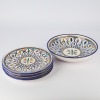 A set of four Moroccan Dinner Plates and a Serving Bowl