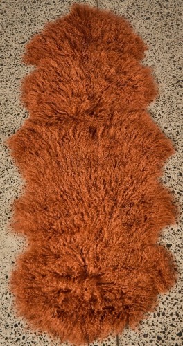 A Tibetan Lamb Rug in Paprika