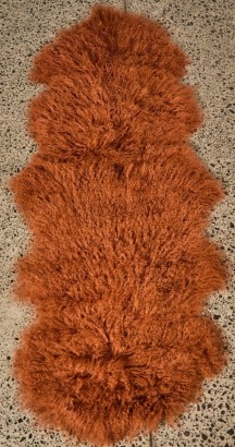 A Tibetan Lamb Rug in Paprika
