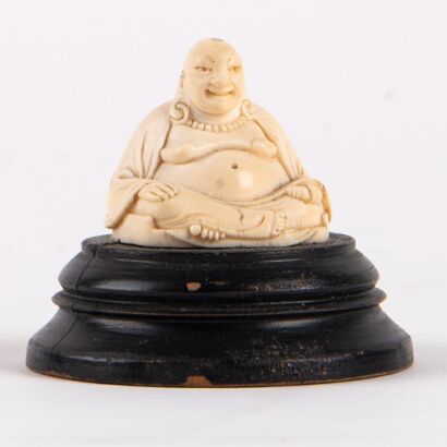 A Chinese Bone Carved Figure of a Seated Luohan