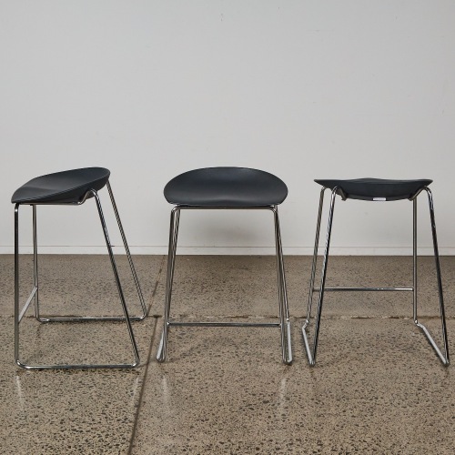 A Set of Three Minimal Bar Stools