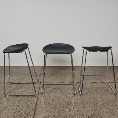 A Set of Three Minimal Bar Stools