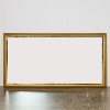 A Large Bevelled Rectangular Glass Mirror in a Gold Frame
