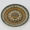 A Small Egyptian Pewter Plate
