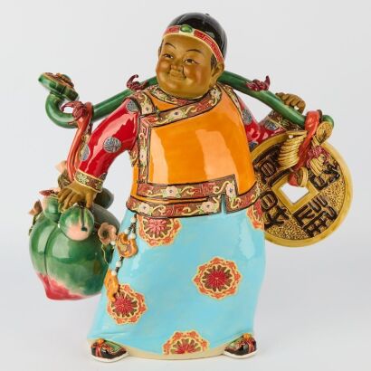 A Chinese 20th Century Foshan Pottery Figure of a Boy Attendant