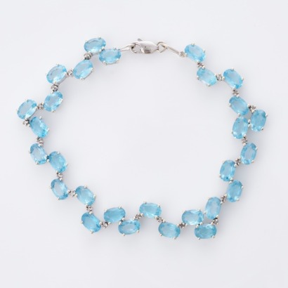 9ct White Gold, Oval Blue Topaz / 0.10ct Diamond Bracelet
