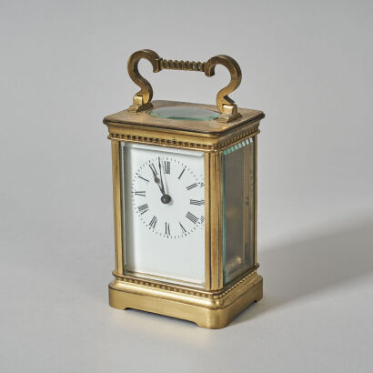 A Small Brass Cased Five Window Carriage Clock