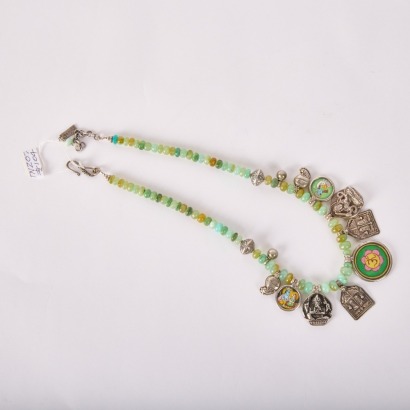 An Asian Aged Jade Bead and Silver Pendant Necklace