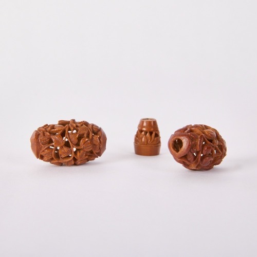 A Group of Three Chinese Qing Dynasty Small Olive Pit Carvings