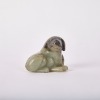 A Chinese Ming Dynasty Carved Hetian Jade Dog