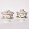 A Pair of Chinese19th Century Qing Dynasty Guangxu Period Famille Rose &lsquo;Hundred Butterflies&rsquo; Covered Tea Cups and Saucers (Qing Dynasty Guangxu Year Mark)