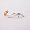 A Chinese Qing Dynasty Famille Rose Dragon Head Belt Hook (Qianlong Year Red Mark)