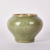 A Chinese Qing Dynasty Longquan Celadon Carved Jar
