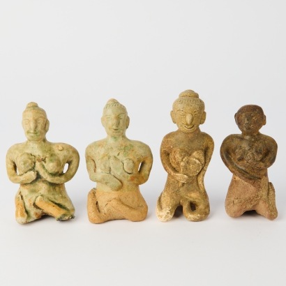 A Group of Four South Asian Celadon Glazed Figure Ornaments