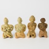 A Group of Four South Asian Celadon Glazed Figure Ornaments