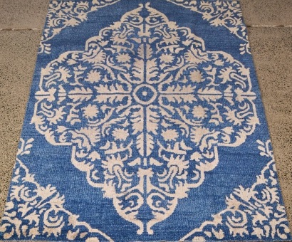 A Hand-Knotted Artisan Rug
