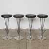 A Set of Four Piet Hein Bar Stools