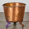 A Copper Planter With Claw Feet
