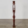 An African Carved Wooden Figure Candlestick