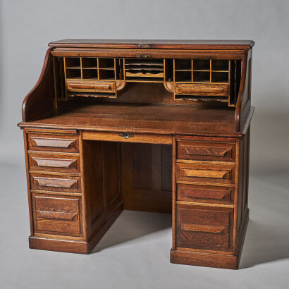 A Late 19th Century Cutler American Roll Top Desk