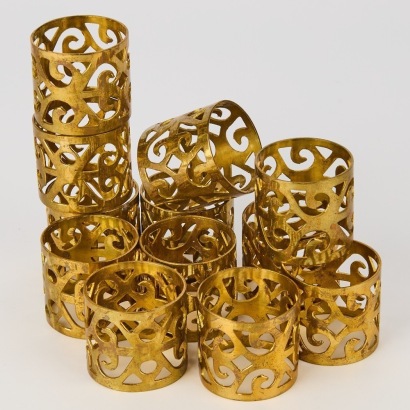 A Set of Twelve Brass Napkin Rings