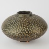 A Terracotta Pot with Dimples