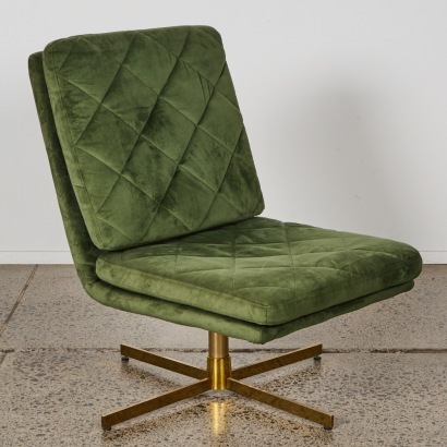 A Green Velvet Swivel Chair