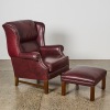 A Leather Wingback Chair and Footstool