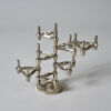 A Set of Seven BMF Nagel Candleholders and Base