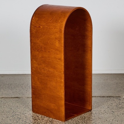 A Curved Wood Alcove Shelf Unit