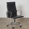 An Eames EA-109 Aluminium Group Chair By ICF