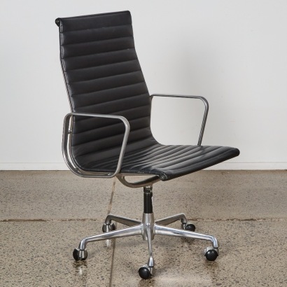 An Eames EA-109 Aluminium Group Chair By ICF