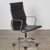 An Eames EA-109 Aluminium Group Chair By ICF