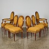 A Set of French Empire Style Dining Chairs