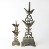 A Set of Two Late 19th Century Chinese Pewter Candlesticks with Fu and Shou motifs