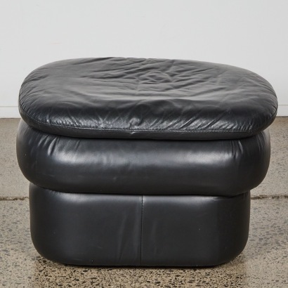 A Vintage Eighties Curvy Black Leather Ottoman