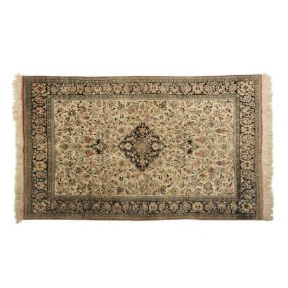 A Fine Quality Silk Iranian Hand Knotted Rug