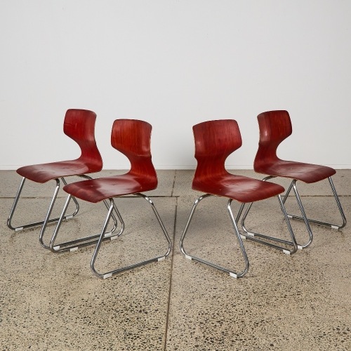 A Set of Four Flototto Style Stacking Plywood Chairs