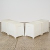 A Set of Four Roombi Indoor/Outdoor Stools