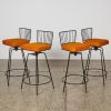 A Set of Four Mid Century Swivel Seat Stool