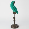 A Parrot Sculpture on Wooden Pedestal Stand