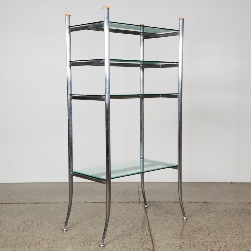 A Freestanding Almunium and Glass Shelving Unit